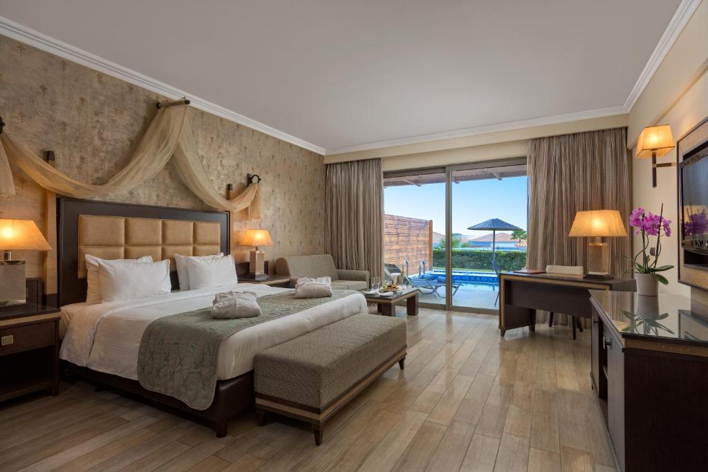 Номер (Бунгало с собственным бассейном (только для взрослых)) курортного отеля La Marquise Luxury Resort Complex, Фалираки