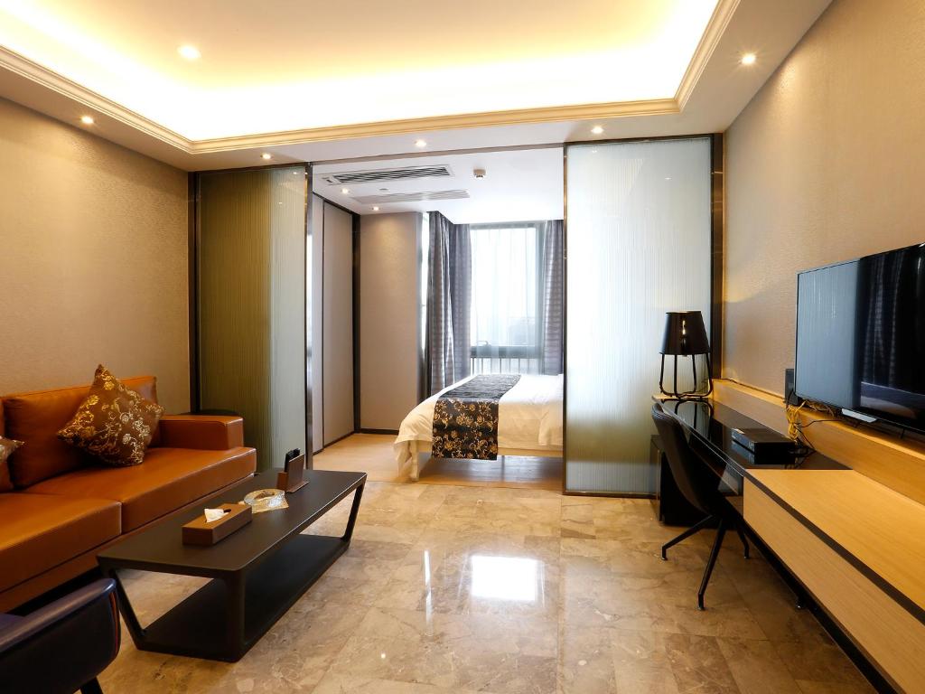 Студио (Двухместный номер-студио Делюкс с 1 кроватью), Pengman Beijing Rd. A-mall Apartment