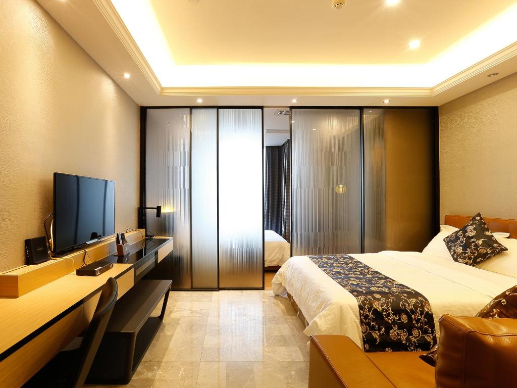 Студио (Двухместный номер-студио Делюкс с 2 отдельными кроватями) апартамента Pengman Beijing Rd. A-mall Apartment, Гуанчжоу