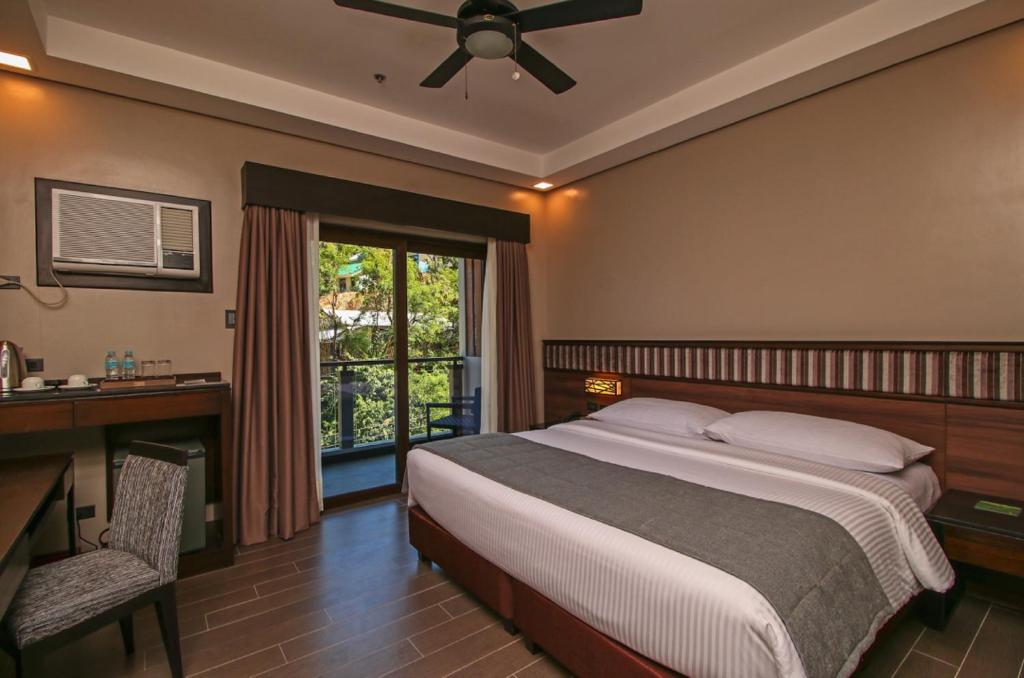 Двухместный (Стандартный двухместный номер с 1 кроватью или 2 отдельными кроватями) отеля Two Seasons Coron Bayside Hotel, Корон
