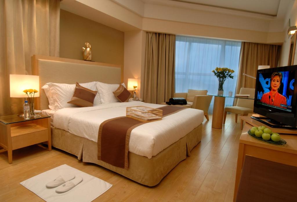 Двухместный (Улучшенный номер с кроватью размера «queen-size») отеля Haiyue Jianguo Hotel, Вэйхай