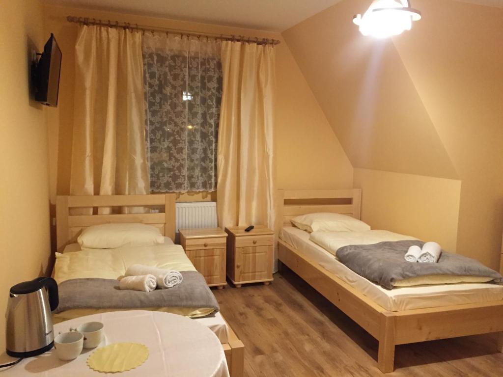 Двухместный (Двухместный номер с 2 отдельными кроватями и балконом) семейного отеля Willa Aziza, Косцелиско