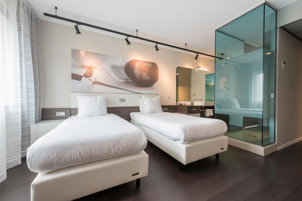 Двухместный (Улучшенный двухместный номер с 2 отдельными кроватями) отеля Hotel Papendal, Арнем