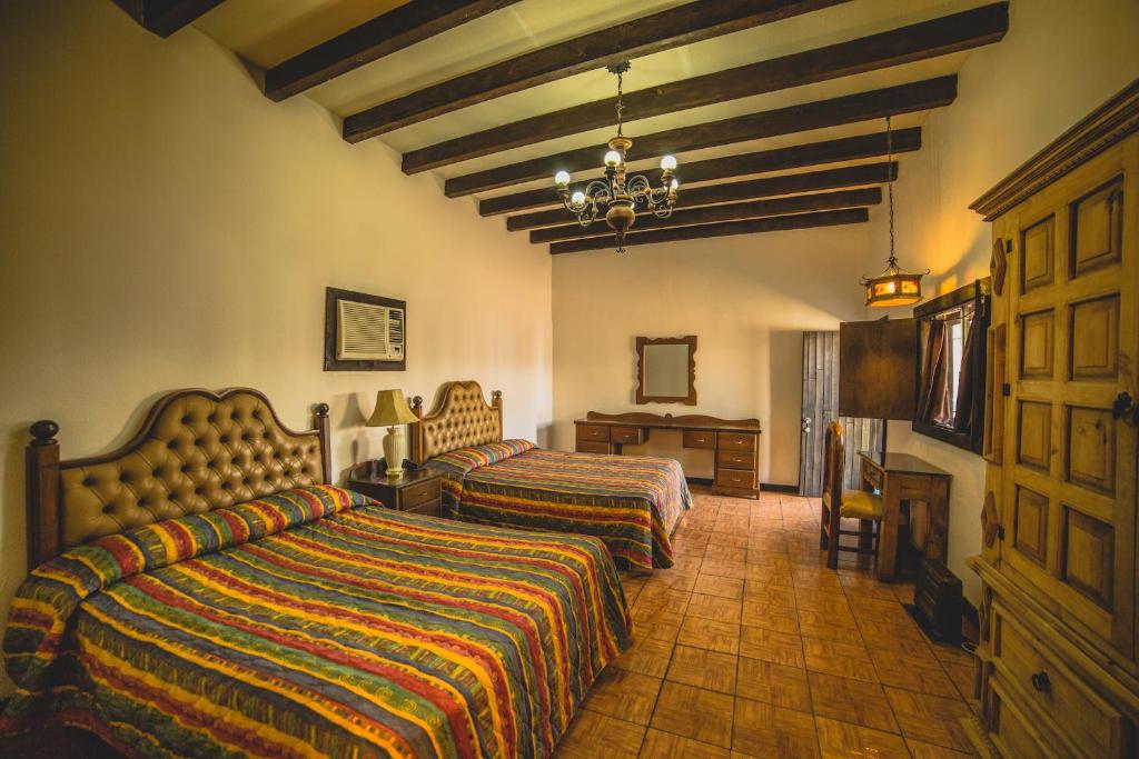 Двухместный (Двухместный номер с 2 отдельными кроватями) отеля Hotel Cosmos Don Carlos, Мехикали