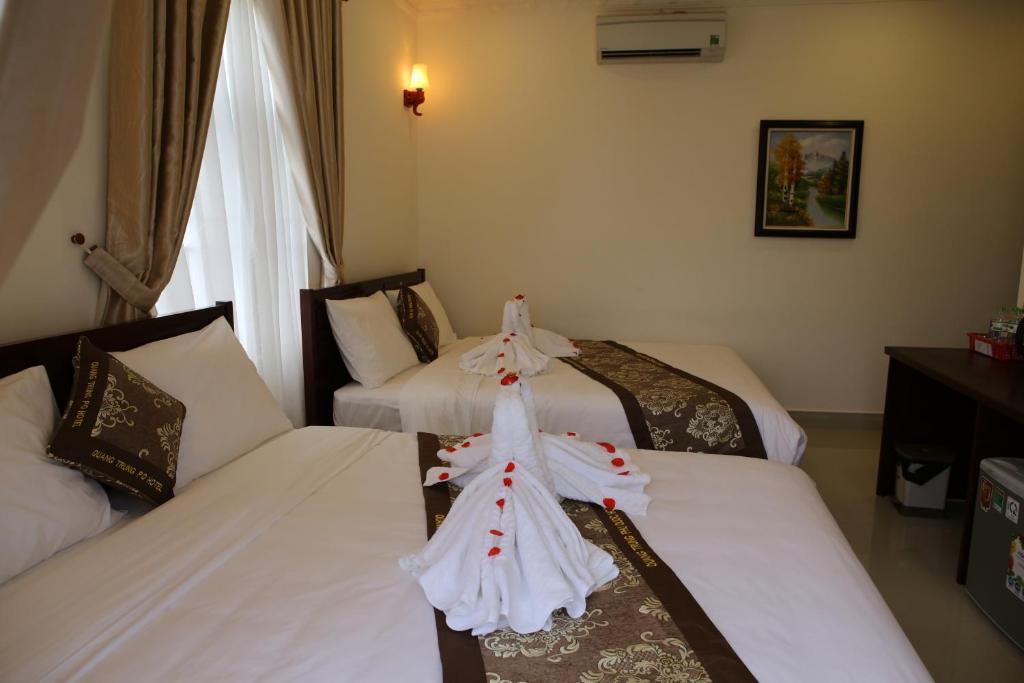 Двухместный (Двухместный номер с 1 кроватью или 2 отдельными кроватями и балконом) отеля Quang Trung Phu Quoc Hotel, Дуонг-Донг