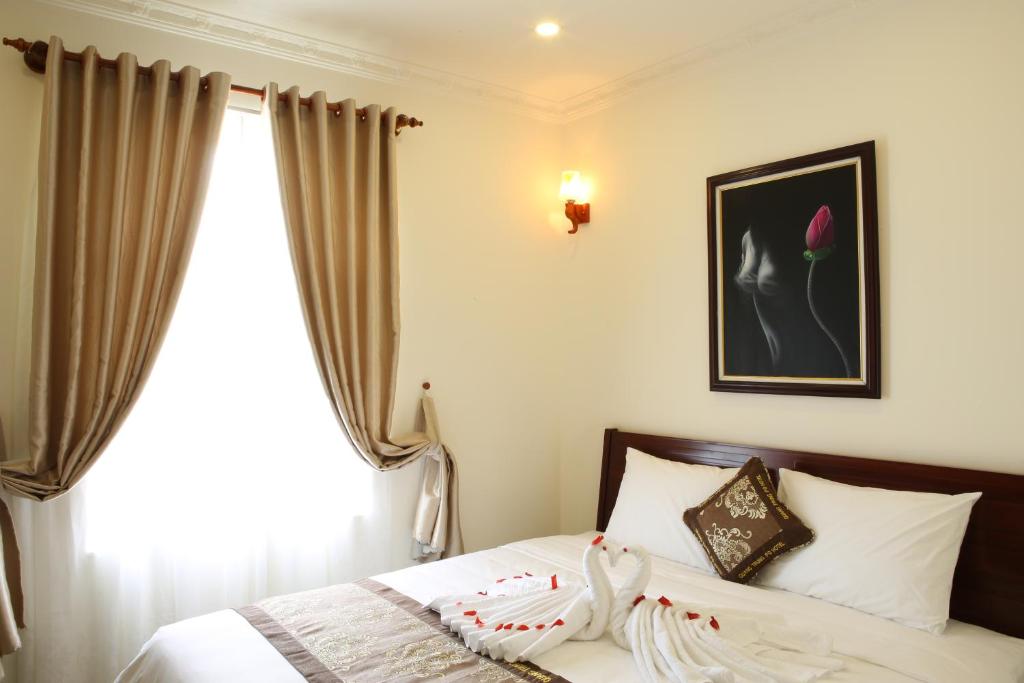 Двухместный (Стандартный номер с кроватью размера «king-size») отеля Quang Trung Phu Quoc Hotel, Дуонг-Донг