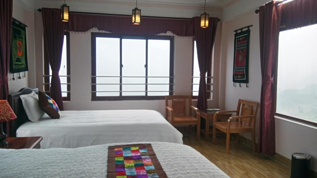 Двухместный (Улучшенный двухместный номер с 1 кроватью или 2 отдельными кроватями, вид на горы) отеля Black H'mong View Hotel, Сапа