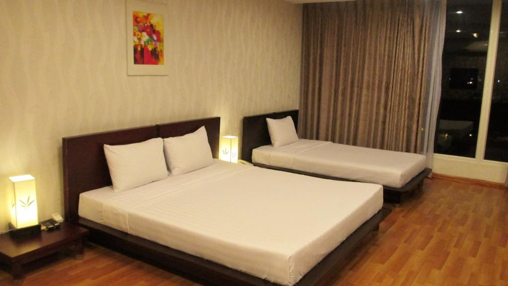 Двухместный (Улучшенный двухместный номер с 1 кроватью или 2 отдельными кроватями, вид на город) отеля Kim Tho Hotel, Кантхо