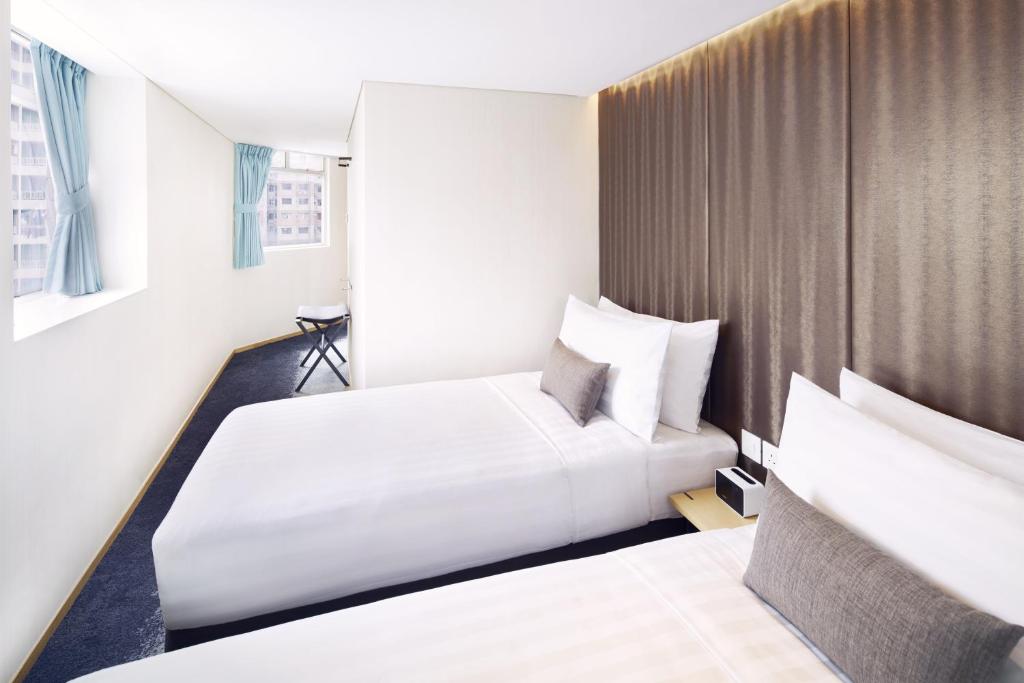 Двухместный (Улучшенный двухместный номер с 2 отдельными кроватями) отеля Hotel 108, Гонконг (город)