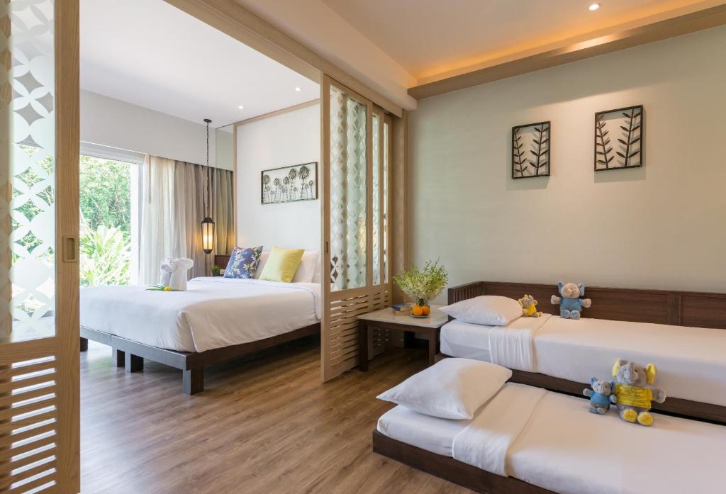 Двухместный (Двухместный номер «Гранд» Делюкс с 1 кроватью) курортного отеля Katathani Phuket Beach Resort, Пхукет