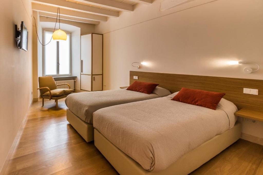 Двухместный (Улучшенный двухместный номер с 1 кроватью или 2 отдельными кроватями) отеля B&B Belle Arti, Бергамо