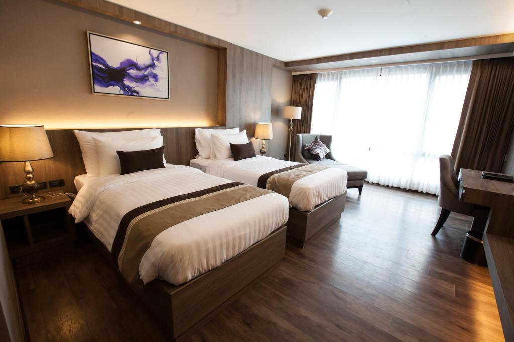 Двухместный (Двухместный номер Делюкс с 2 отдельными кроватями) отеля Arte, Бангкок
