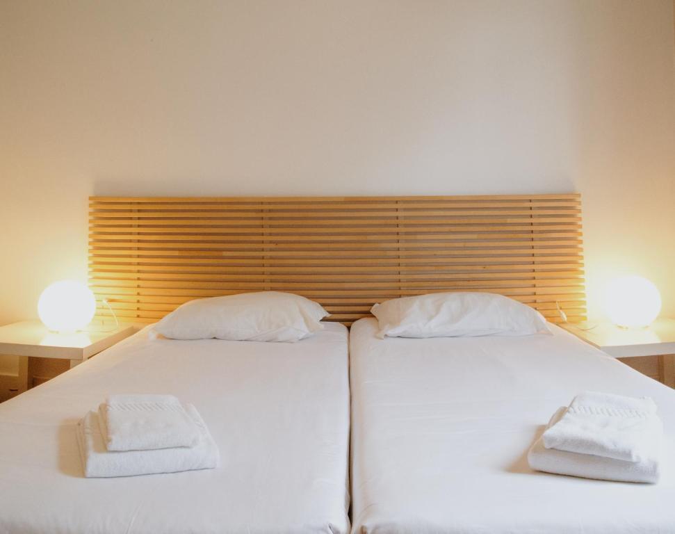 Двухместный (Двухместный номер с 2 отдельными кроватями и собственной ванной комнатой) хостела Porto Spot Hostel, Порту