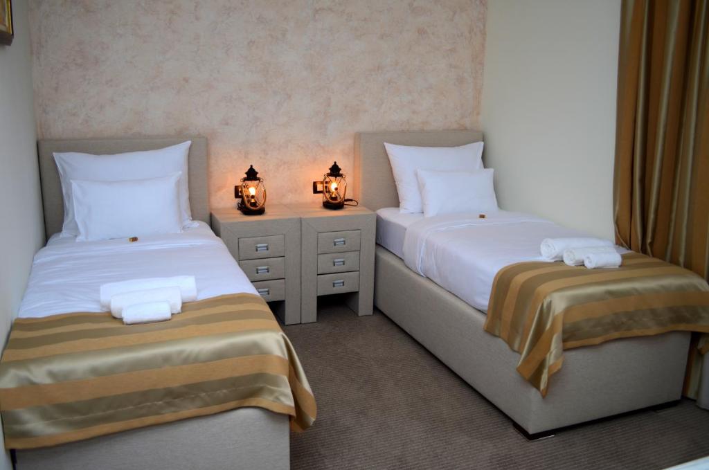 Двухместный (Стандартный двухместный номер с 1 кроватью или 2 отдельными кроватями) отеля Hotel Helada, Тиват