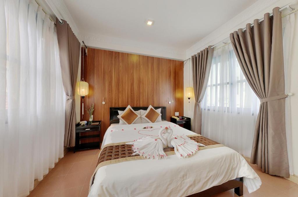 Двухместный (Улучшенный двухместный номер с 1 кроватью) отеля Hai Yen Hotel, Хойан