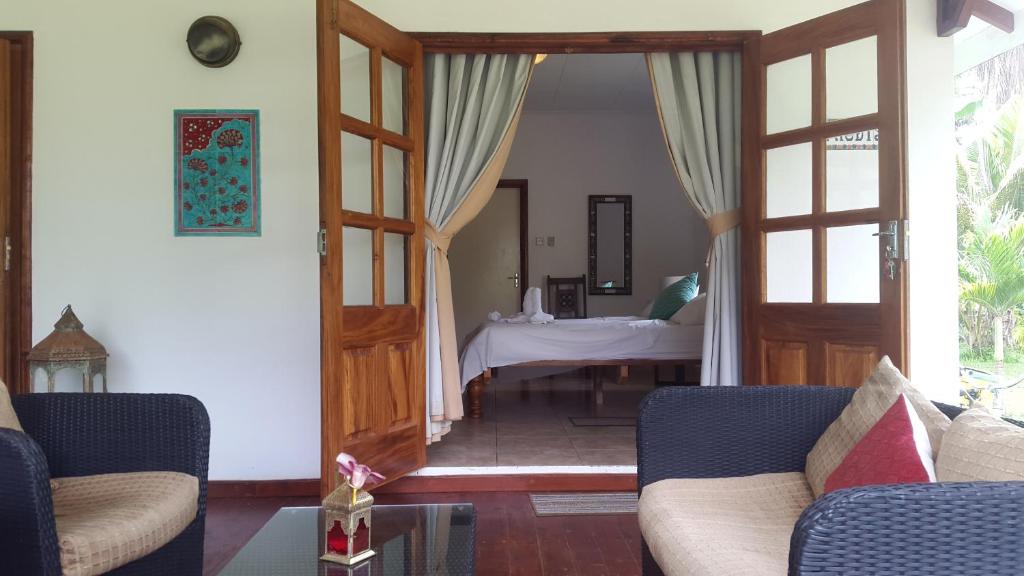 Двухместный (Двухместный номер Делюкс с 1 кроватью и балконом) гостевого дома Paodise Guesthouse, Ла-Диг
