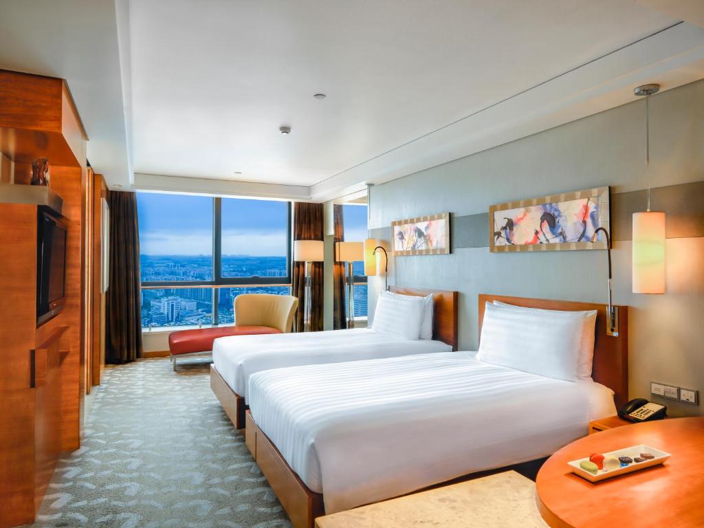 Двухместный (Номер Swiss Advantage с 2 отдельными кроватями) отеля Swissotel Foshan, Guangdong, Фошань