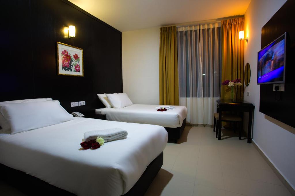 Двухместный (Бюджетный двухместный номер с 2 отдельными кроватями) отеля Akar Hotel Jalan TAR, Куала-Лумпур