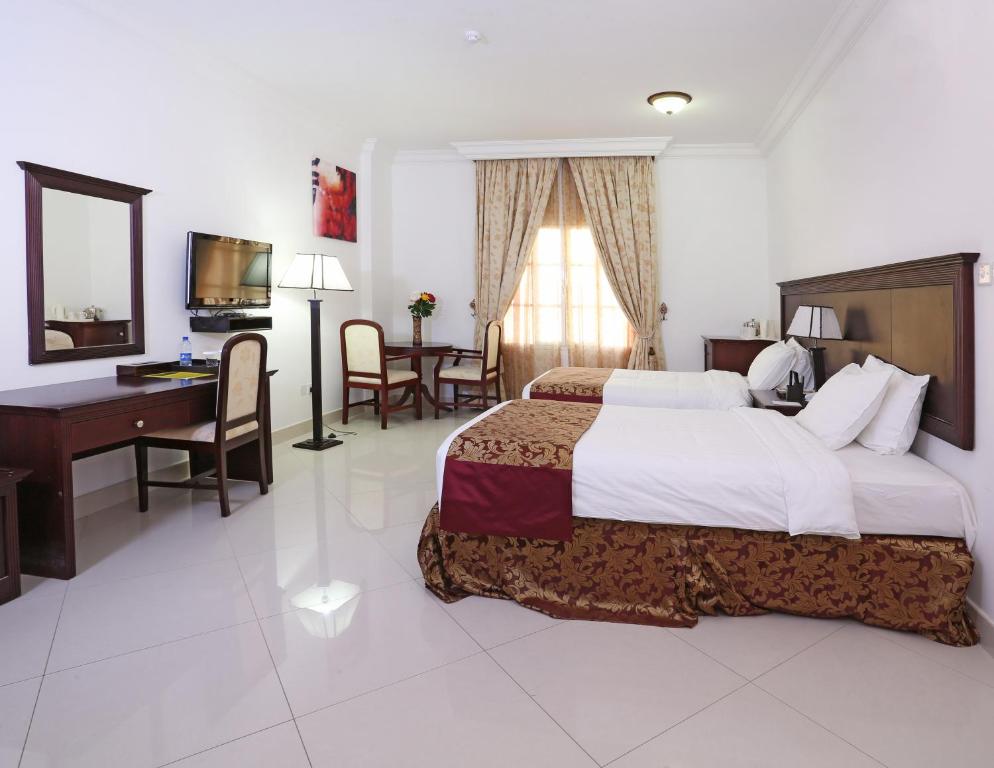 Двухместный (Двухместный номер Делюкс с 2 отдельными кроватями) отеля Al Maha International Hotel, Маскат