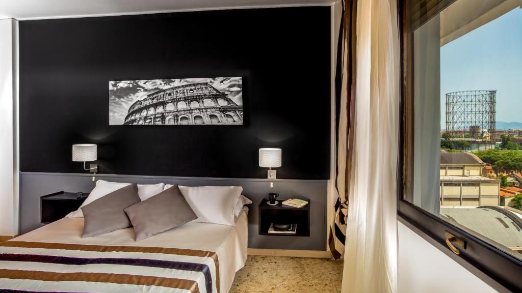 Двухместный (Двухместный номер Делюкс с 1 кроватью и балконом) отеля Radio Hotel, Рим