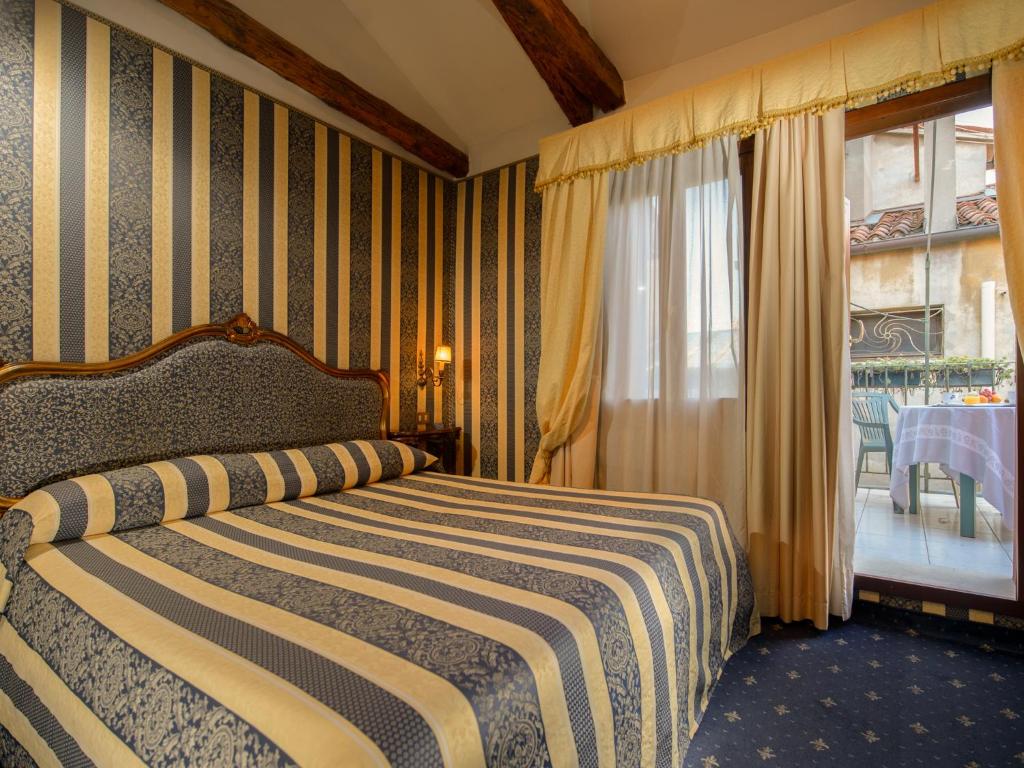 Двухместный (Улучшенный двухместный номер с 1 кроватью и собственной террасой) отеля Centauro Hotel, Венеция