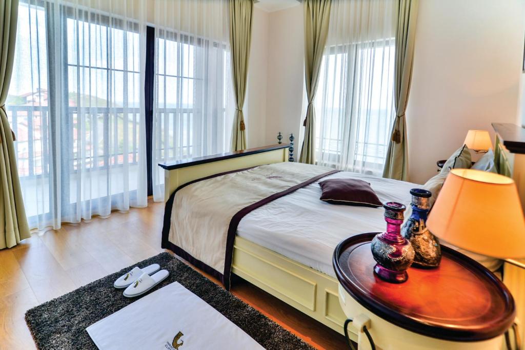 Сьюит (Семейный люкс с 1 спальней - «Марина») курортного отеля Thracian Cliffs Golf & Beach Resort, Каварна