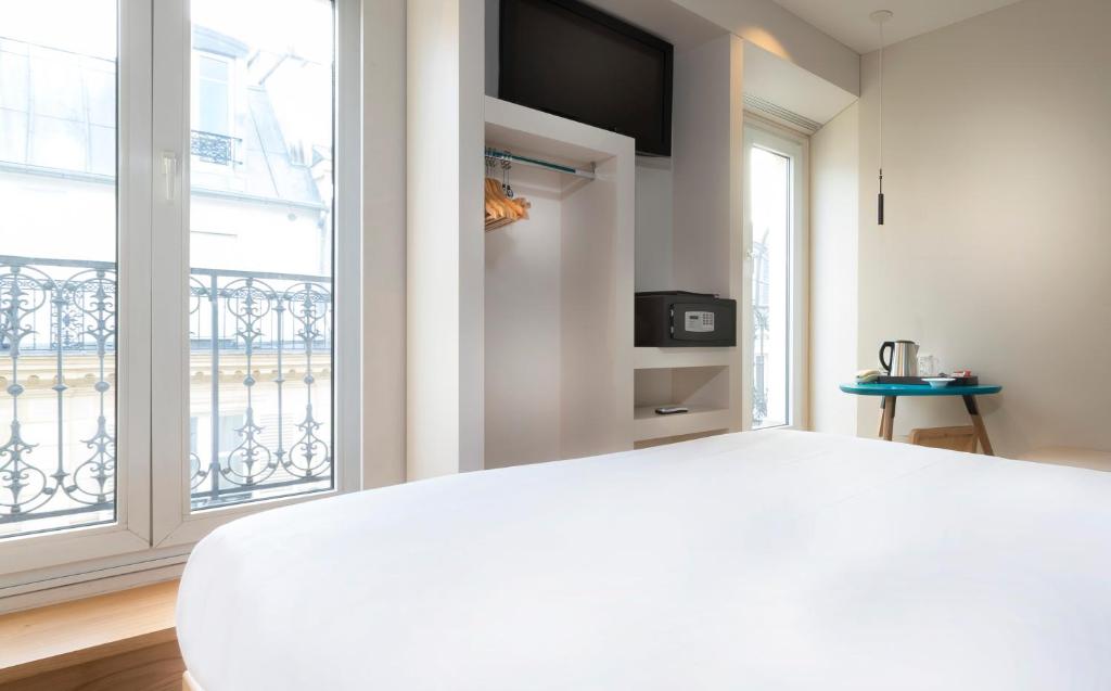 Двухместный (Улучшенный двухместный номер с 1 кроватью) отеля Hotel Andréa, Париж