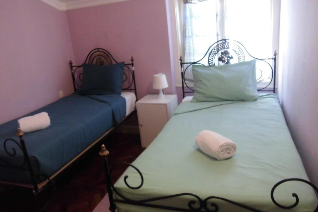 Двухместный (Двухместный номер с 2 отдельными кроватями и общей ванной комнатой) хостела Hostel The White Butterfly, Лагуш