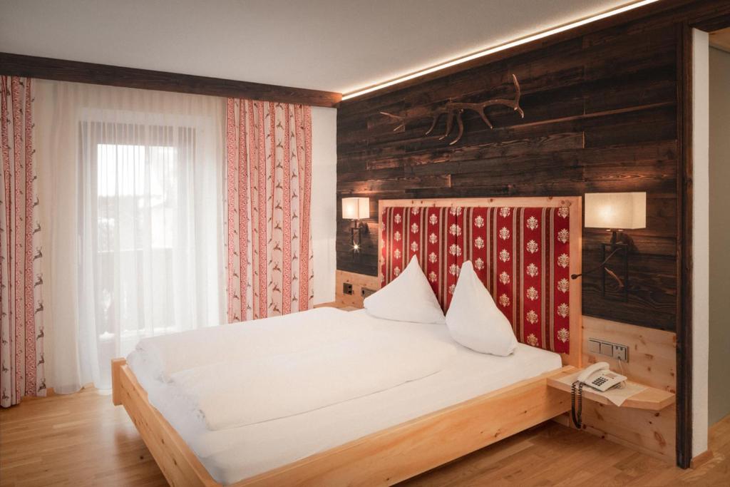 Двухместный (Двухместный номер Делюкс с 1 кроватью и гостиной зоной) отеля Hotel Alpenstolz, Нойштифт