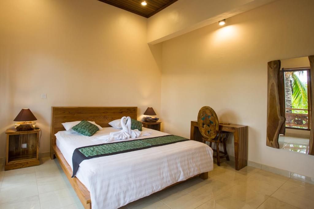Двухместный (Двухместный номер с 1 кроватью и патио) семейного отеля Bulan Bali Homestay & Hostel, Убуд