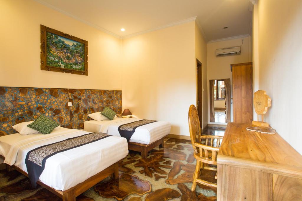 Двухместный (Двухместный номер с 1 кроватью или 2 отдельными кроватями и террасой) семейного отеля Bulan Bali Homestay & Hostel, Убуд