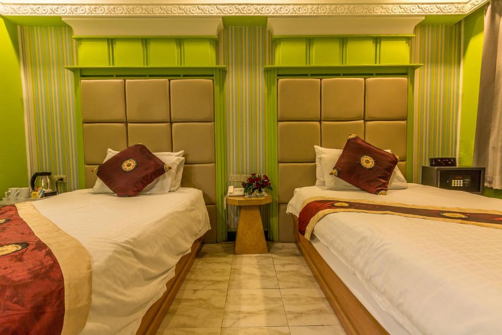 Двухместный (Улучшенный двухместный номер с 1 кроватью или 2 отдельными кроватями) отеля Sam's Lodge, Бангкок