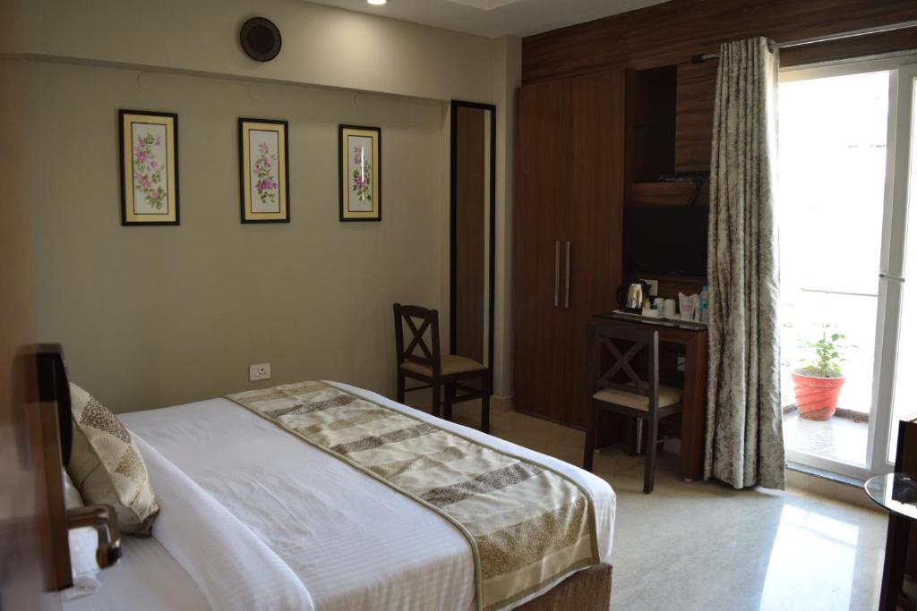 Двухместный (Двухместный номер Делюкс с 1 кроватью) отеля De Bougain Villa, Варанаси