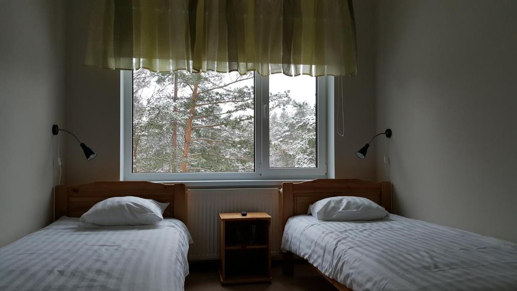 Двухместный (Двухместный номер с 2 отдельными кроватями, вид на сад) хостела Männiku JK, Таллин
