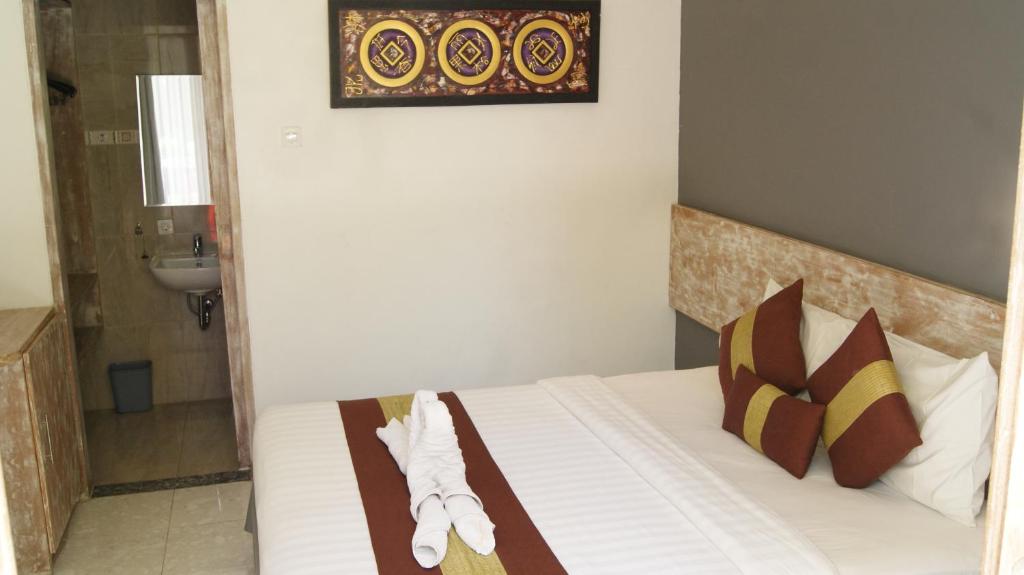 Двухместный (Двухместный номер Делюкс с 1 кроватью или 2 отдельными кроватями) гостевого дома Sugiras Living, Денпасар