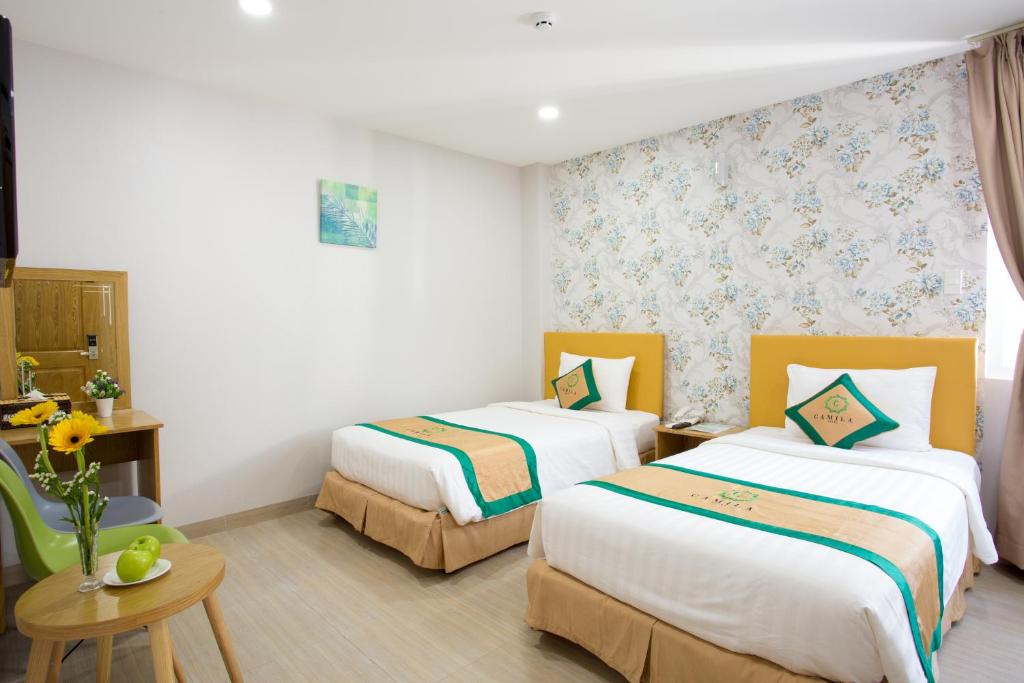 Двухместный (Улучшенный двухместный номер с 2 отдельными кроватями) отеля Camila Hotel, Хошимин