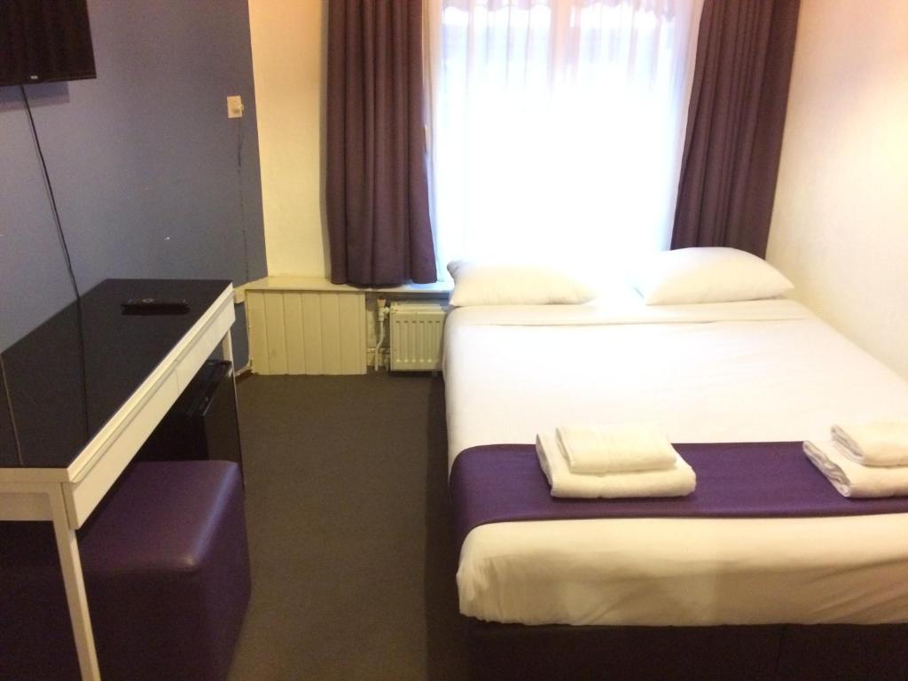 Двухместный (Двухместный номер с 1 кроватью и общей ванной комнатой) отеля Hotel Bellington, Амстердам
