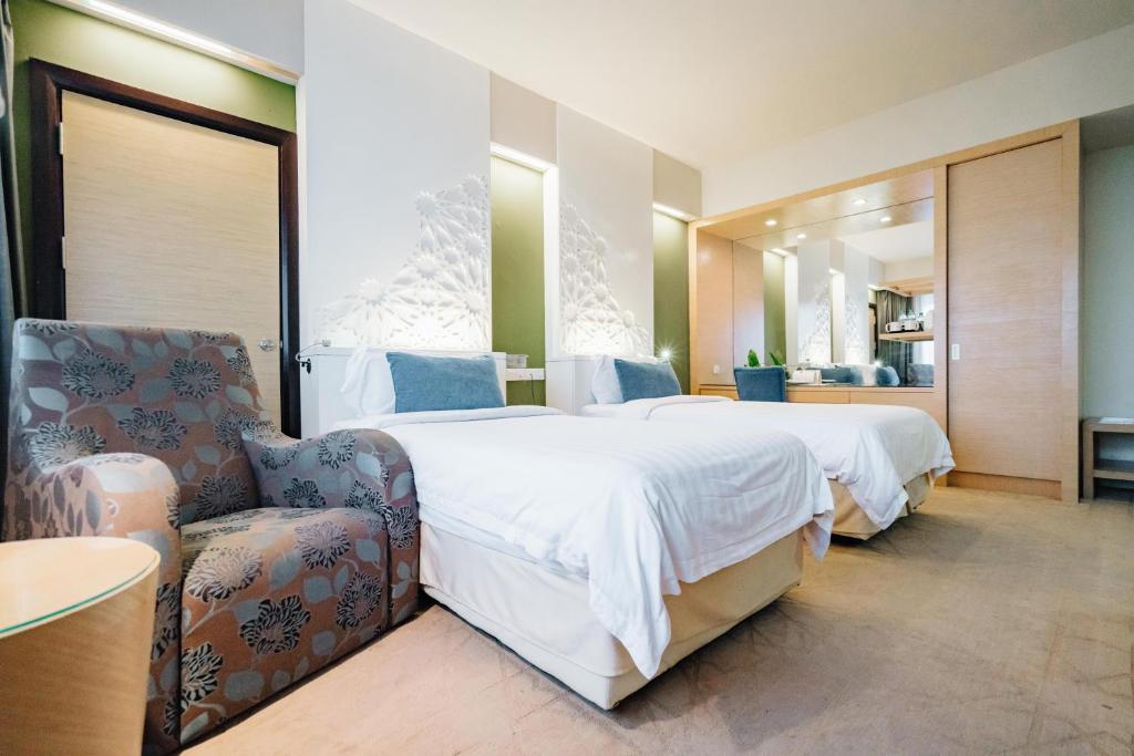Двухместный (Улучшенный двухместный номер с 2 отдельными кроватями) отеля TH Hotel Kota Kinabalu, Кота-Кинабалу
