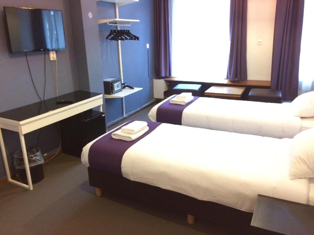 Трехместный (Трехместный номер эконом-класса) отеля Hotel Bellington, Амстердам