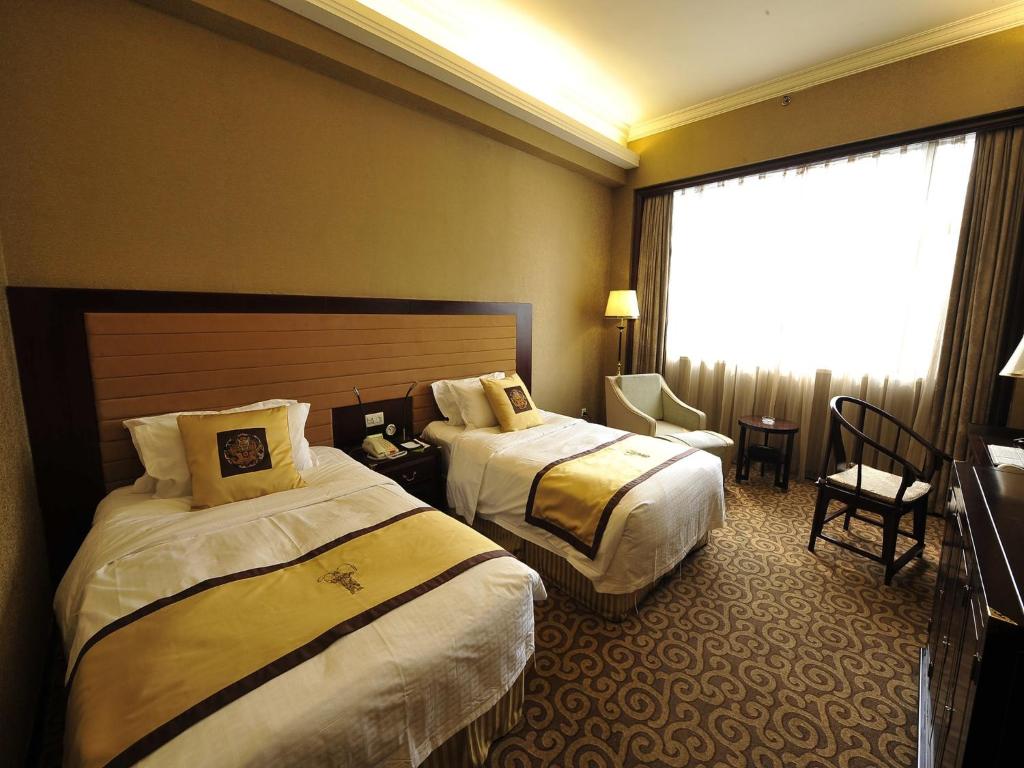Двухместный (Представительский двухместный номер с 2 отдельными кроватями) отеля Jianguo Qianmen Beijing, Пекин