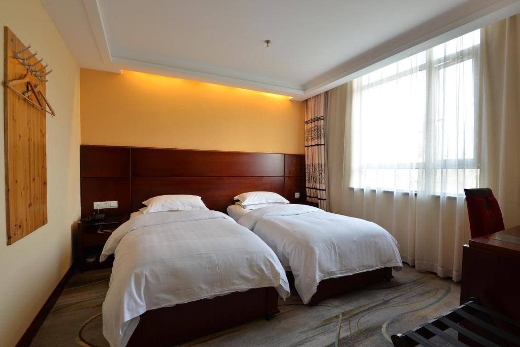 Двухместный (Стандартный двухместный номер с 2 отдельными кроватями) отеля Irene Boutique Hotel - Jinshu Shop, Шанхай