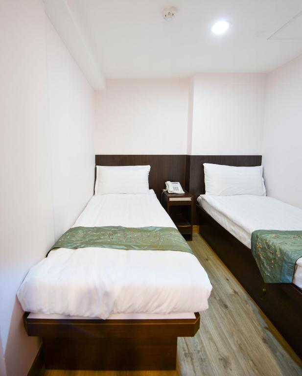 Двухместный (Двухместный номер с 2 отдельными кроватями) отеля Metroplace Olympic Hotel, Гонконг (город)