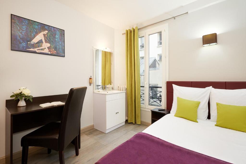 Двухместный (Двухместный номер с 1 кроватью и общей ванной комнатой) отеля Hôtel Viator, Париж