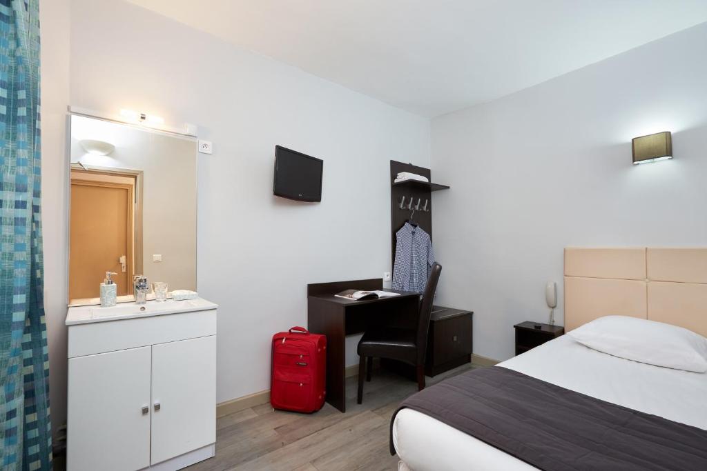 Одноместный (Одноместный номер с общей ванной комнатой) отеля Hôtel Viator, Париж