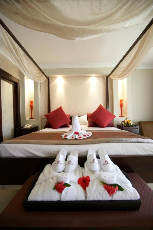 Двухместный (Люкс с 1 спальней и гидромассажной ванной (для 2 взрослых и 2 детей) - Бесплатный Wi-Fi) курортного отеля Majestic Elegance - Punta Cana, Баваро