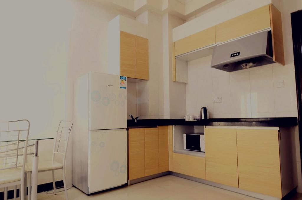 Трехместный (Люкс бизнес-класса с 3 кроватями), Guangzhou Kalai Serviced Apartment