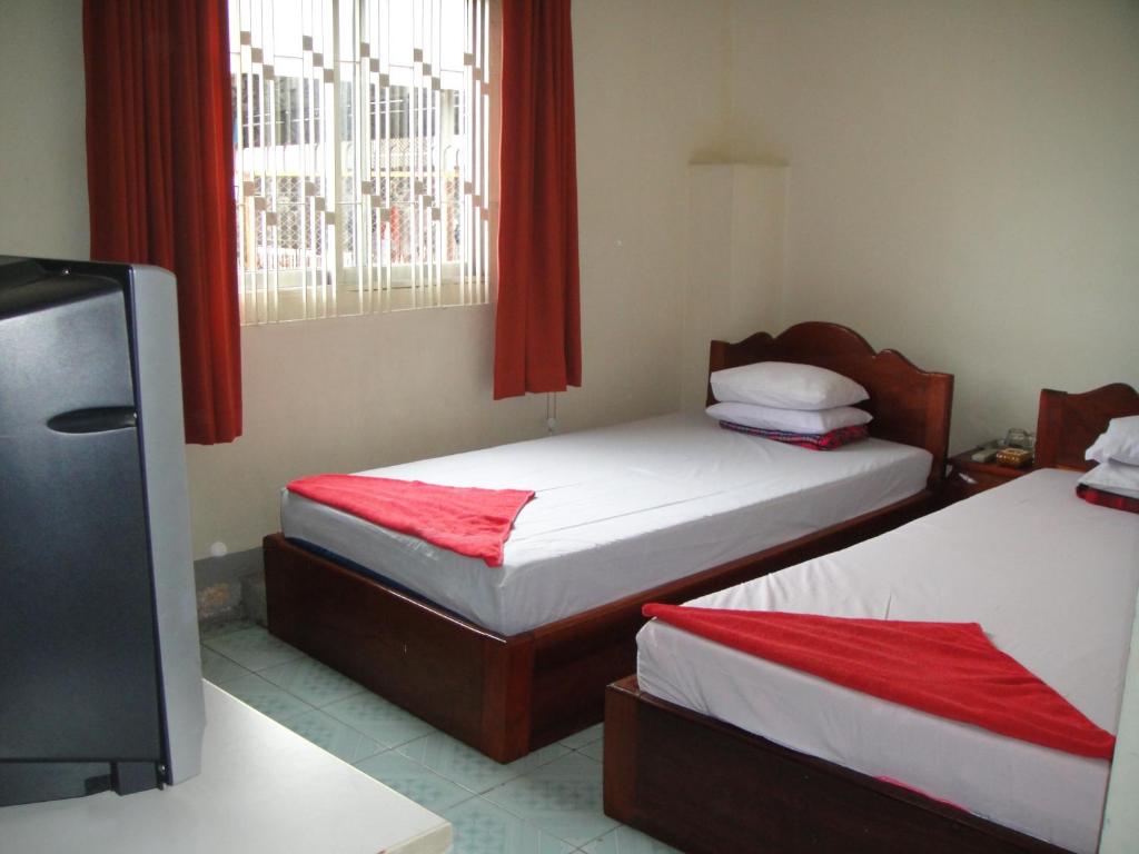 Двухместный (Двухместный номер с 2 отдельными кроватями и ванной комнатой) отеля Capitol One, Пномпень
