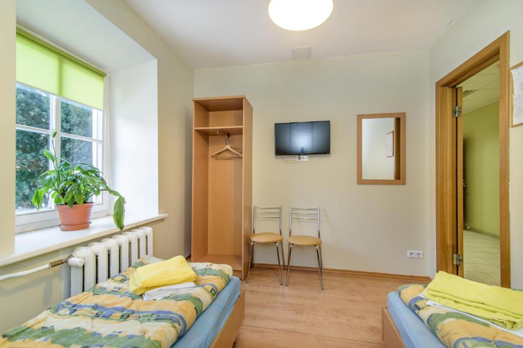 Двухместный (Двухместный номер с 2 отдельными кроватями) хостела Hostel Filaretai, Вильнюс