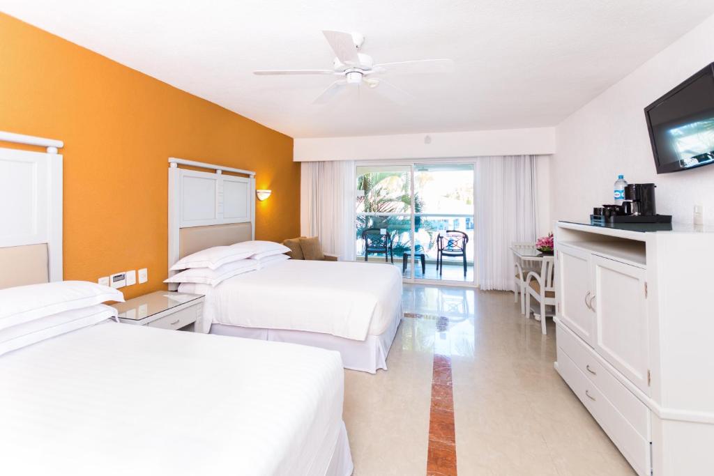 Двухместный (Двухместный номер с 1 кроватью рядом с океаном (для 2 взрослых и 2 детей)) курортного отеля Occidental Costa Cancún, Канкун