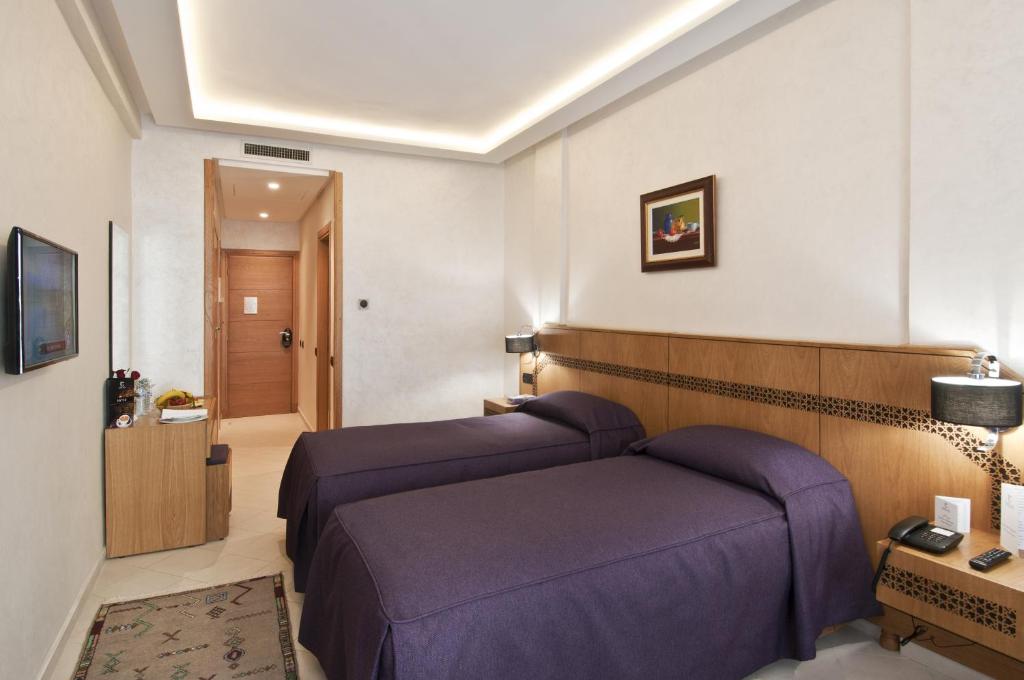 Двухместный (Двухместный номер Делюкс с 1 кроватью или 2 отдельными кроватями) отеля Hôtel l'escale, Фес